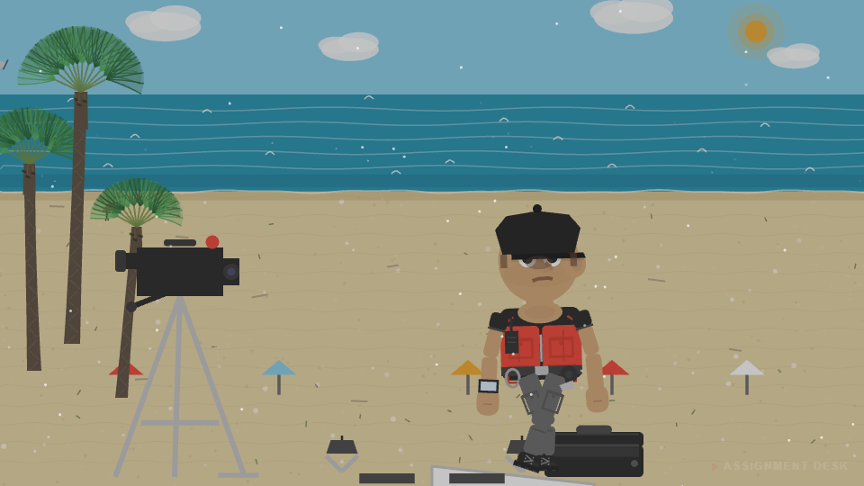 Rain falls on the beach set as Ralphie covers his equipment